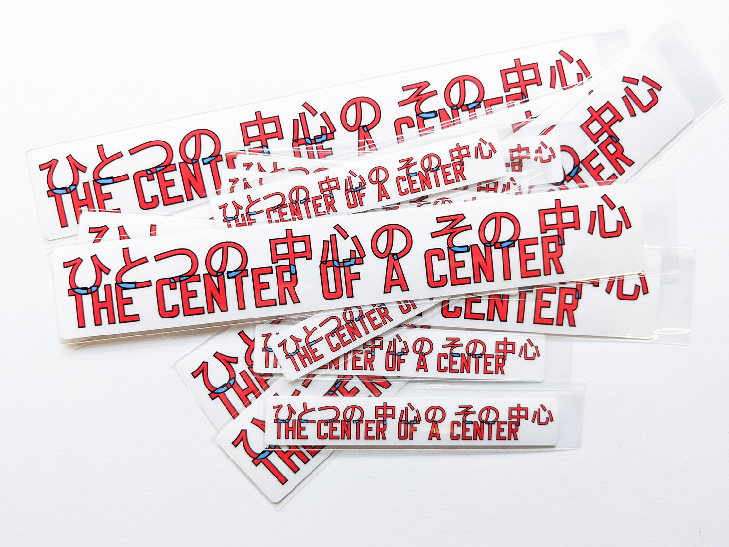 Lawrence Weiner 「ひとつの中心のその中心／THE CENTER OF A CENTER」Sticker